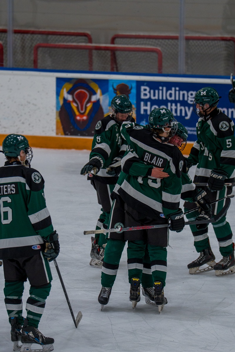 Hockey players celebrating