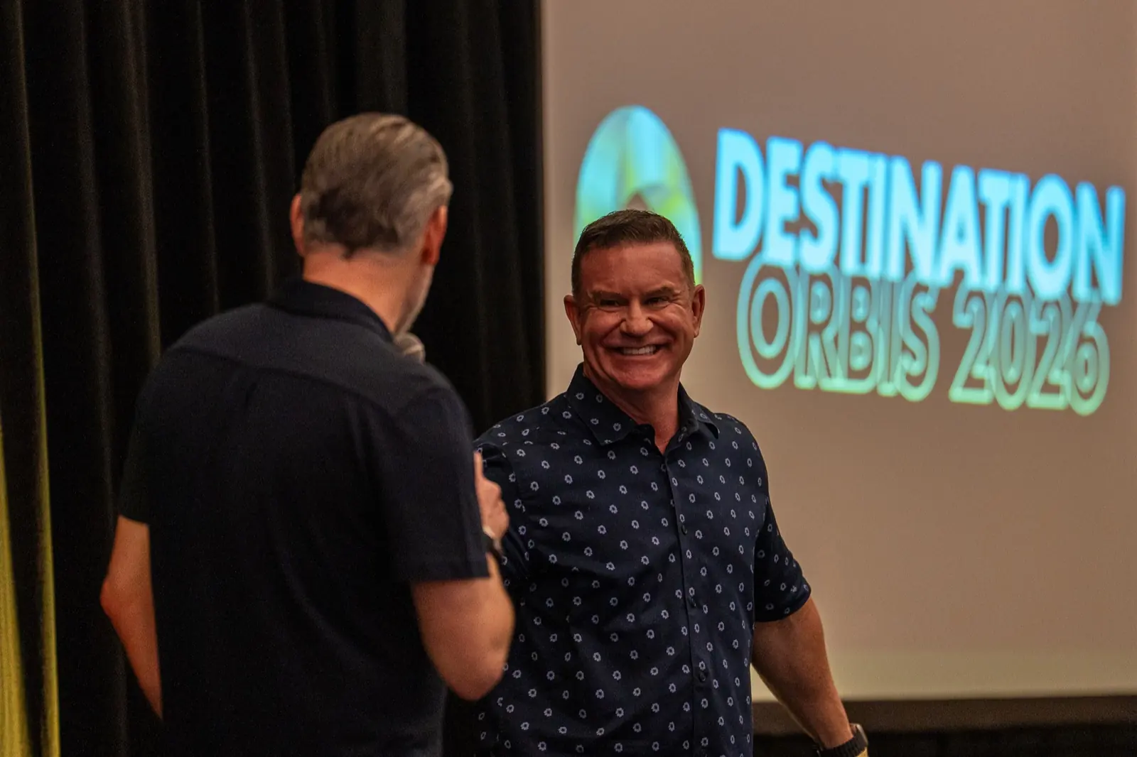 Leadership on stage at Destination Orbis 2026